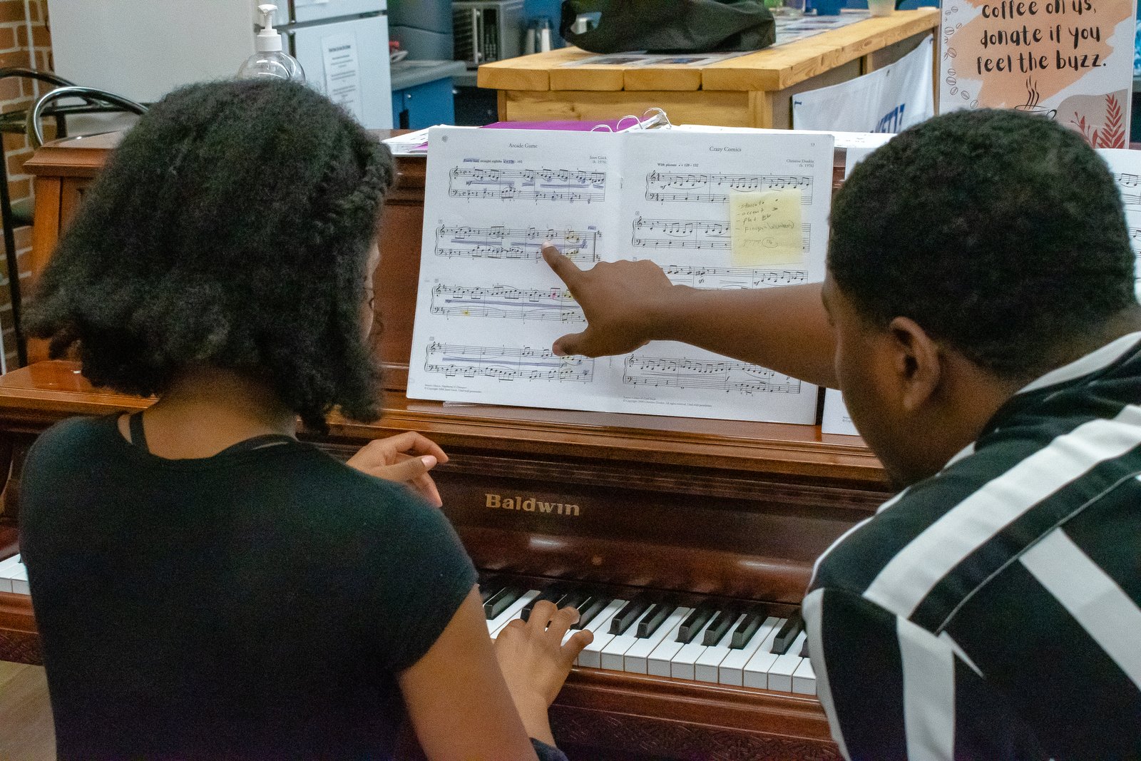 Lagos Sistema student learning piano